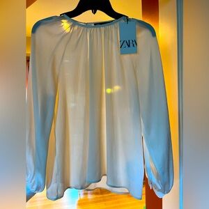 New with tags. Zara ivory long sleeve blouse. Women’s XS